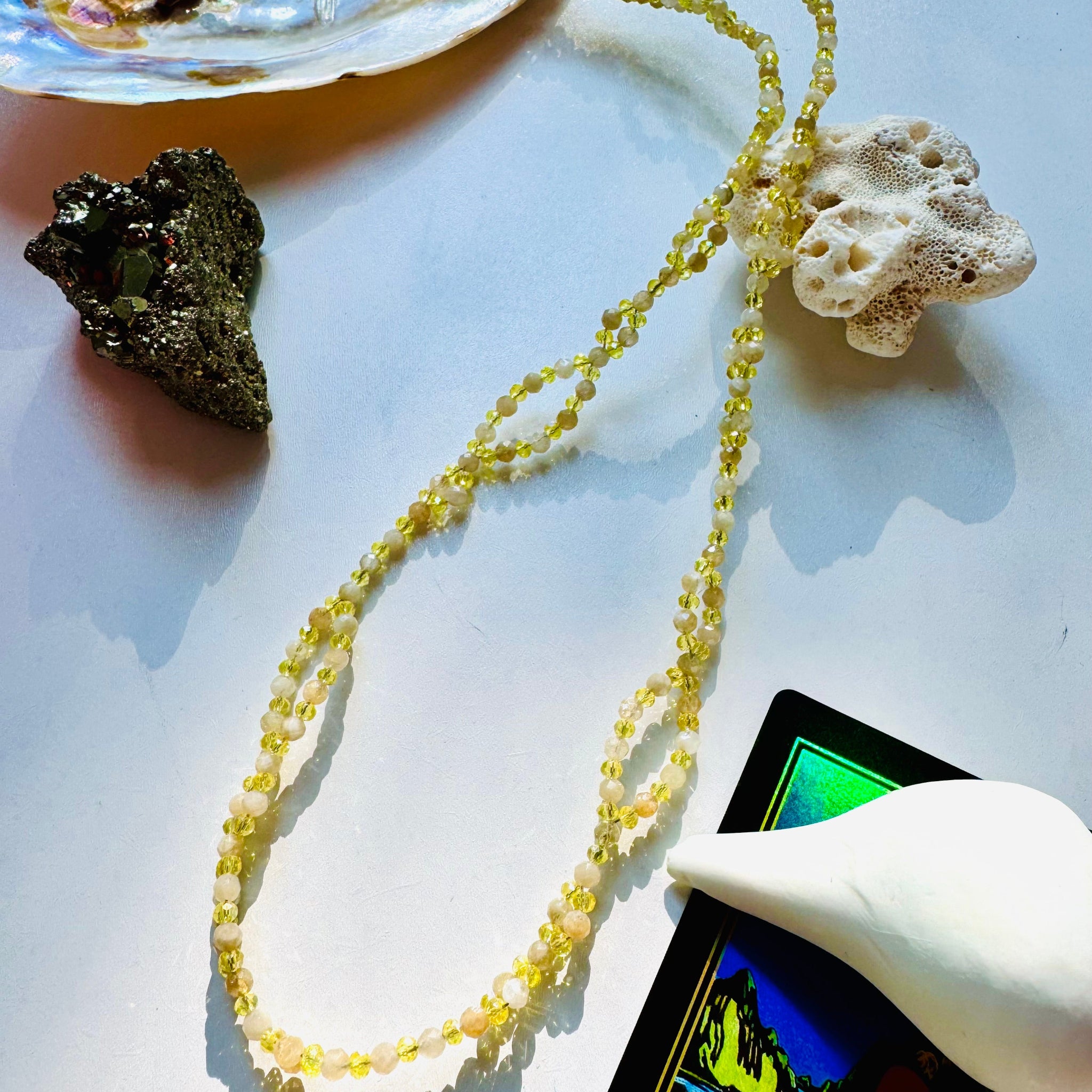 Citrine tantric necklace with black crystal and decorative seashells