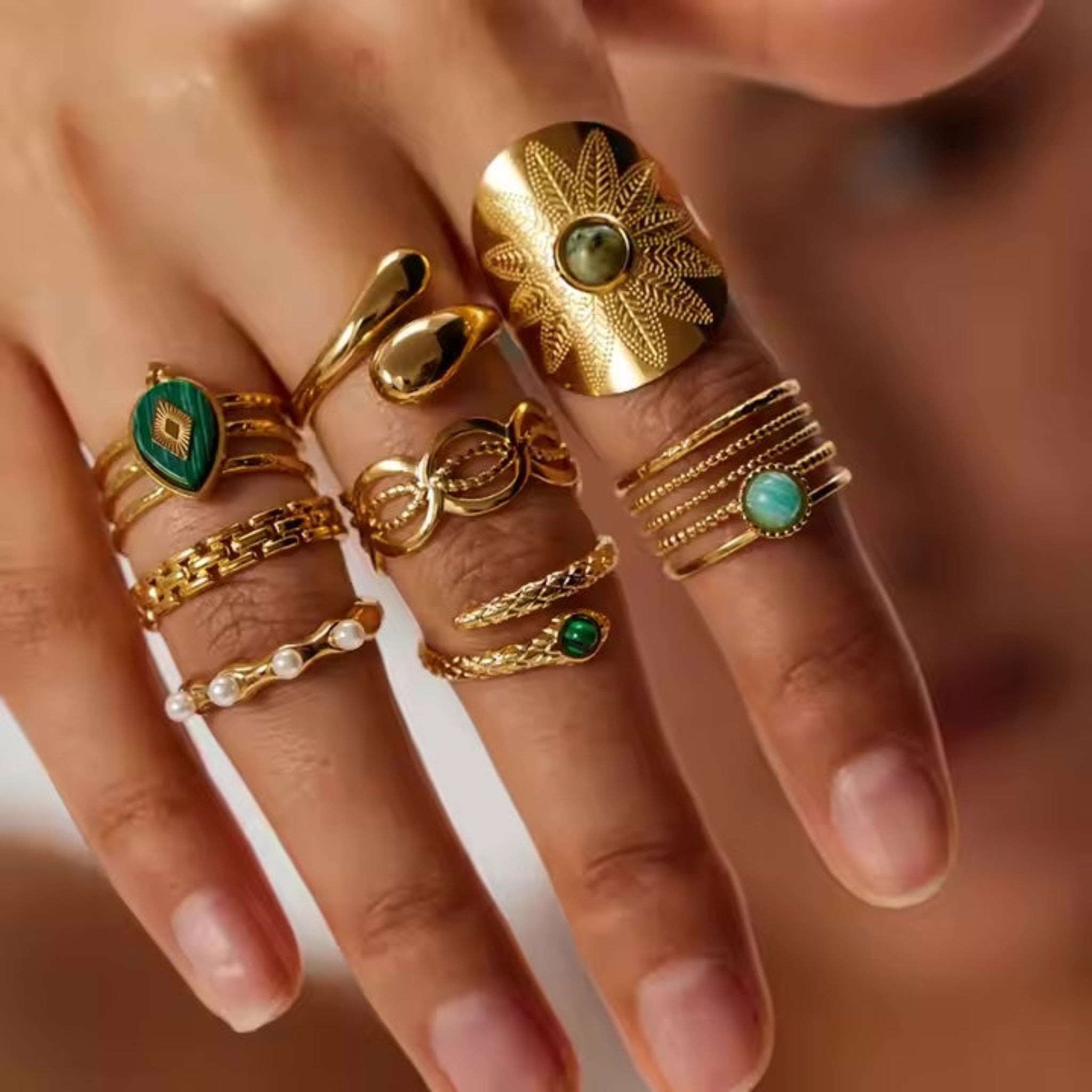 assorted rings on model hand