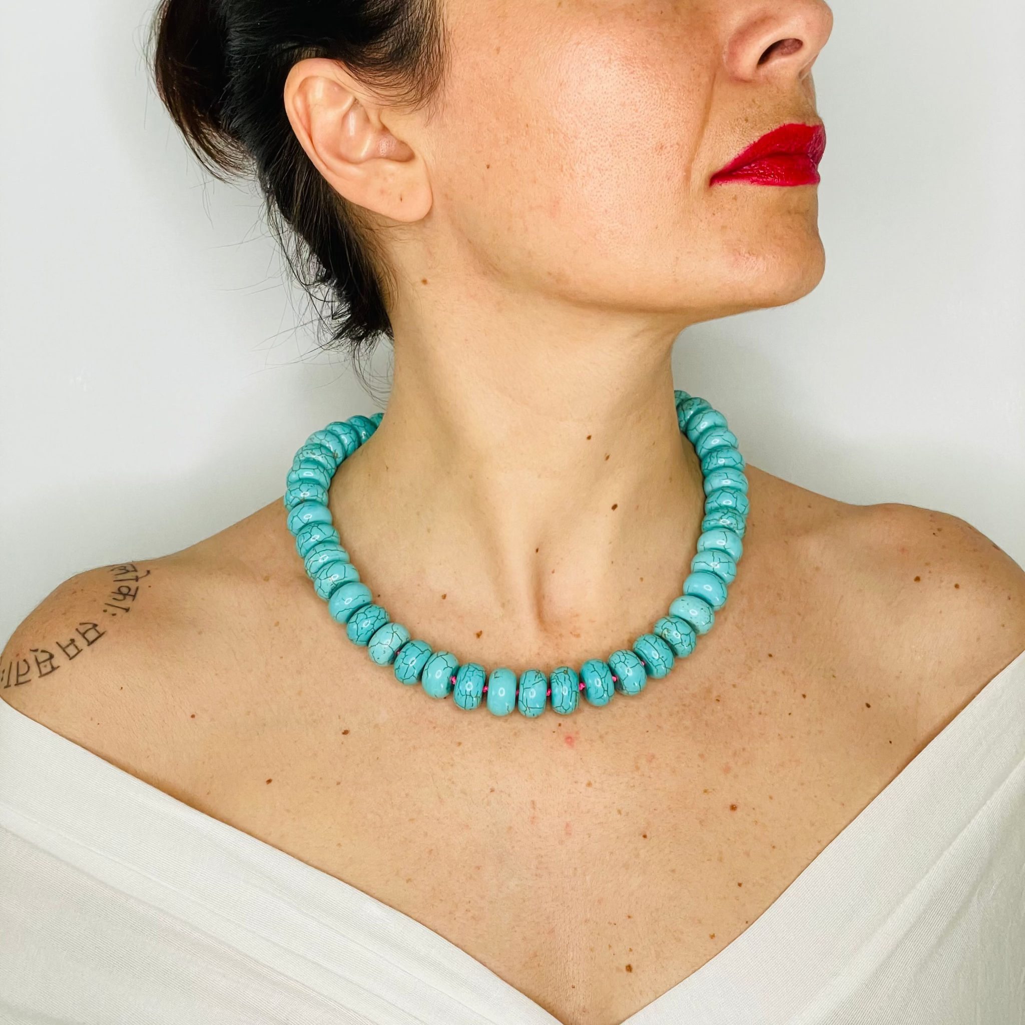 Rondela Beaded Turquoise Statement Necklace on model