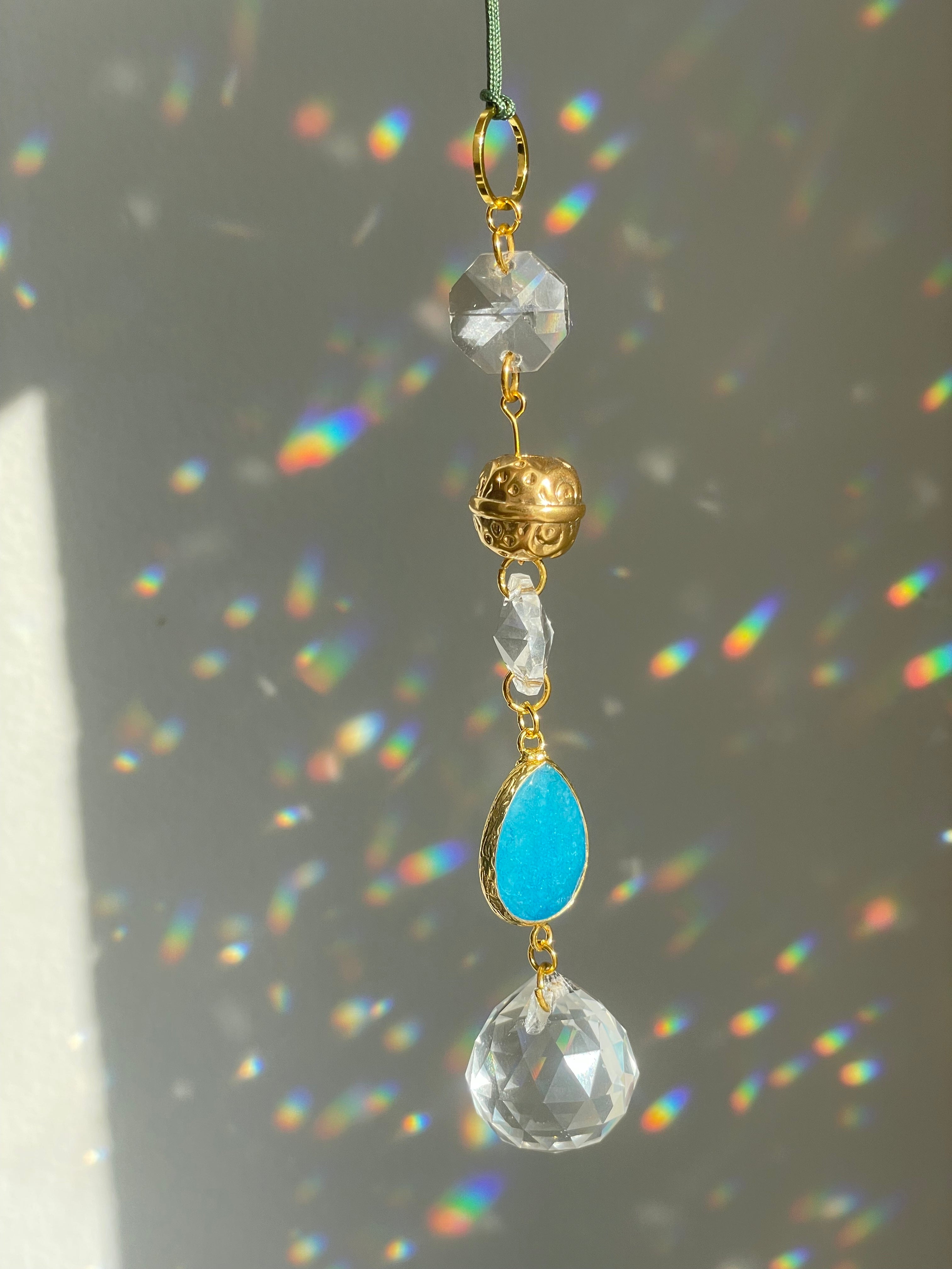 string of ornament with golden ball and blue agate
