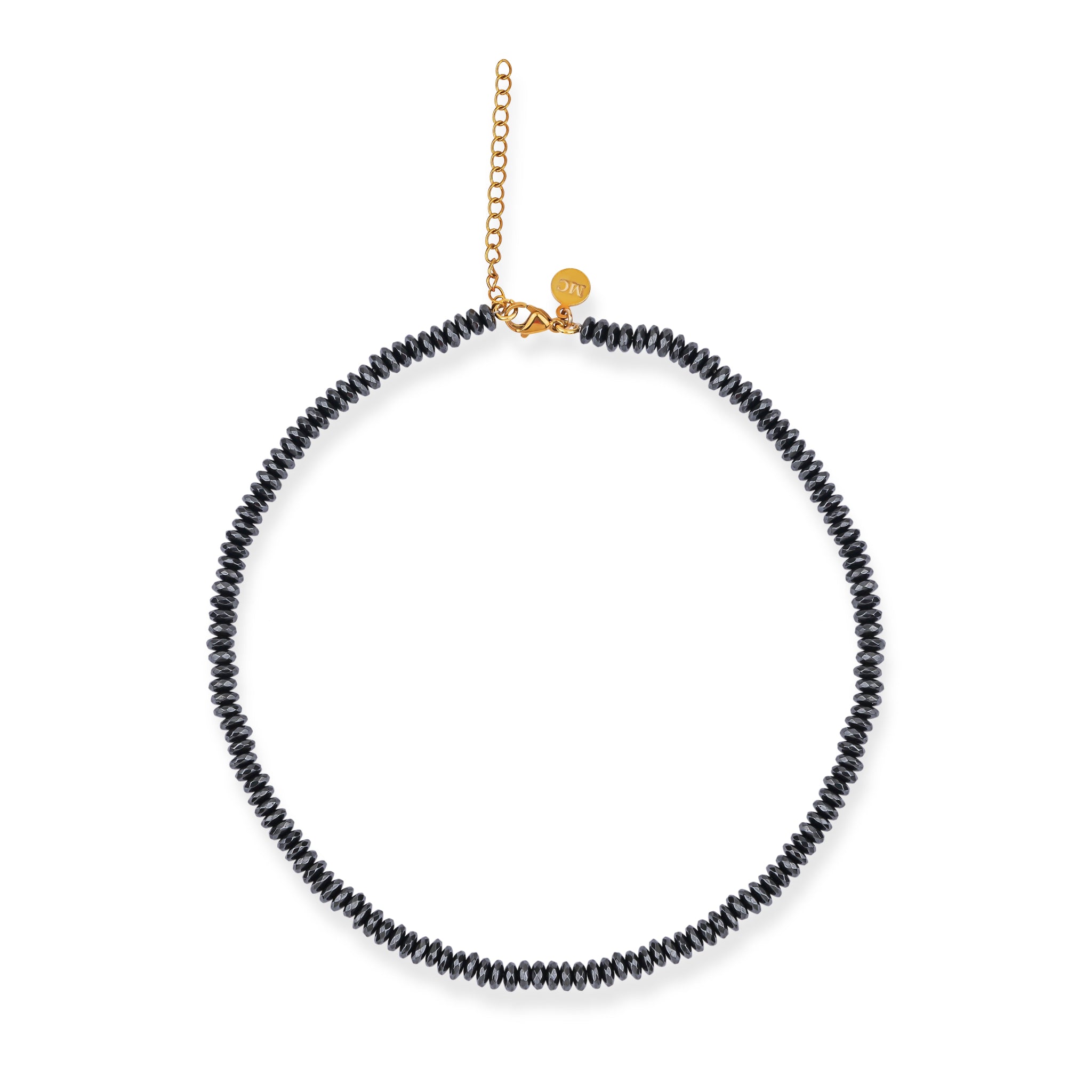 A black hematite necklace with a gold plated sterling silver lobster clasp closure.