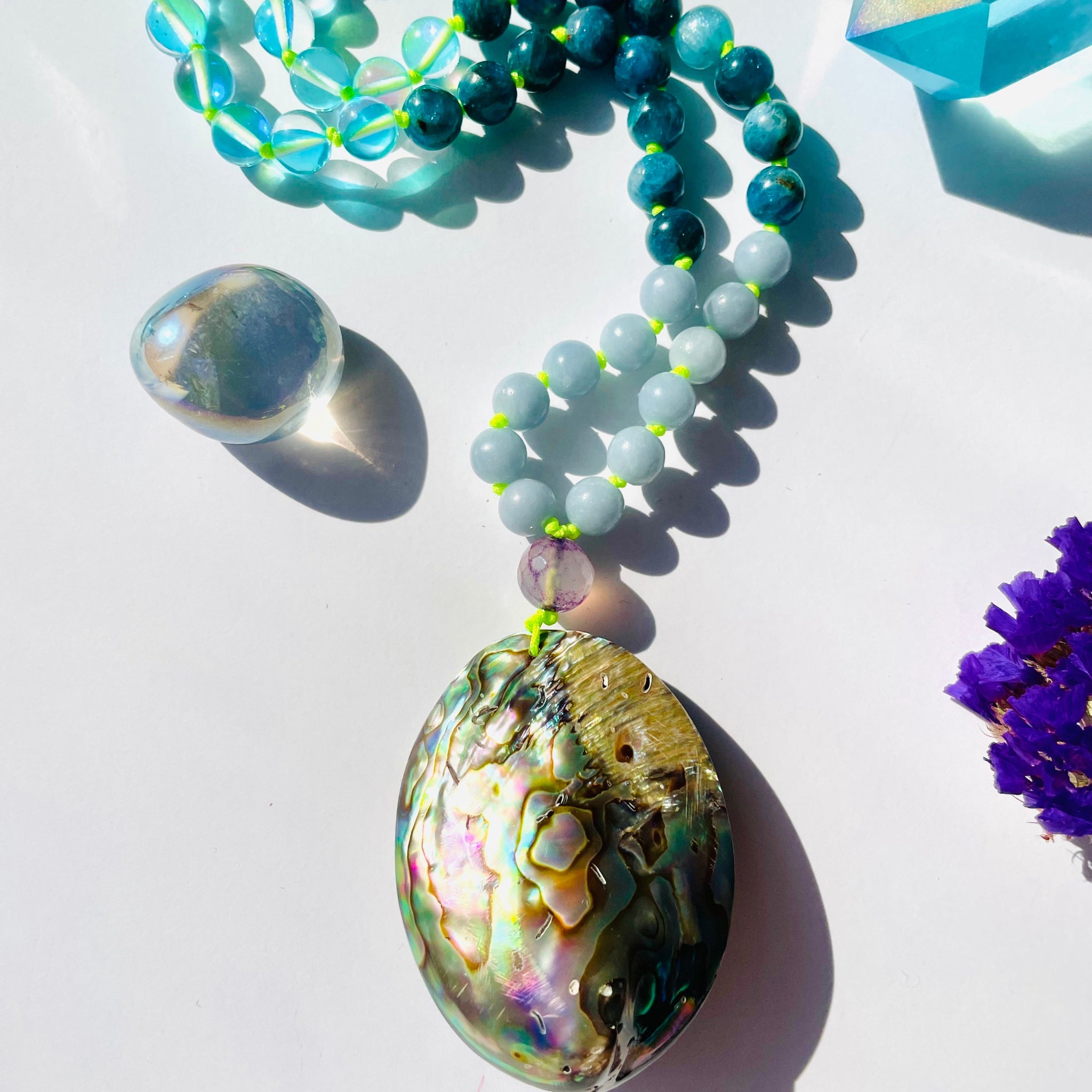 Aquatic Necklace with blue gemstones and hell pendant