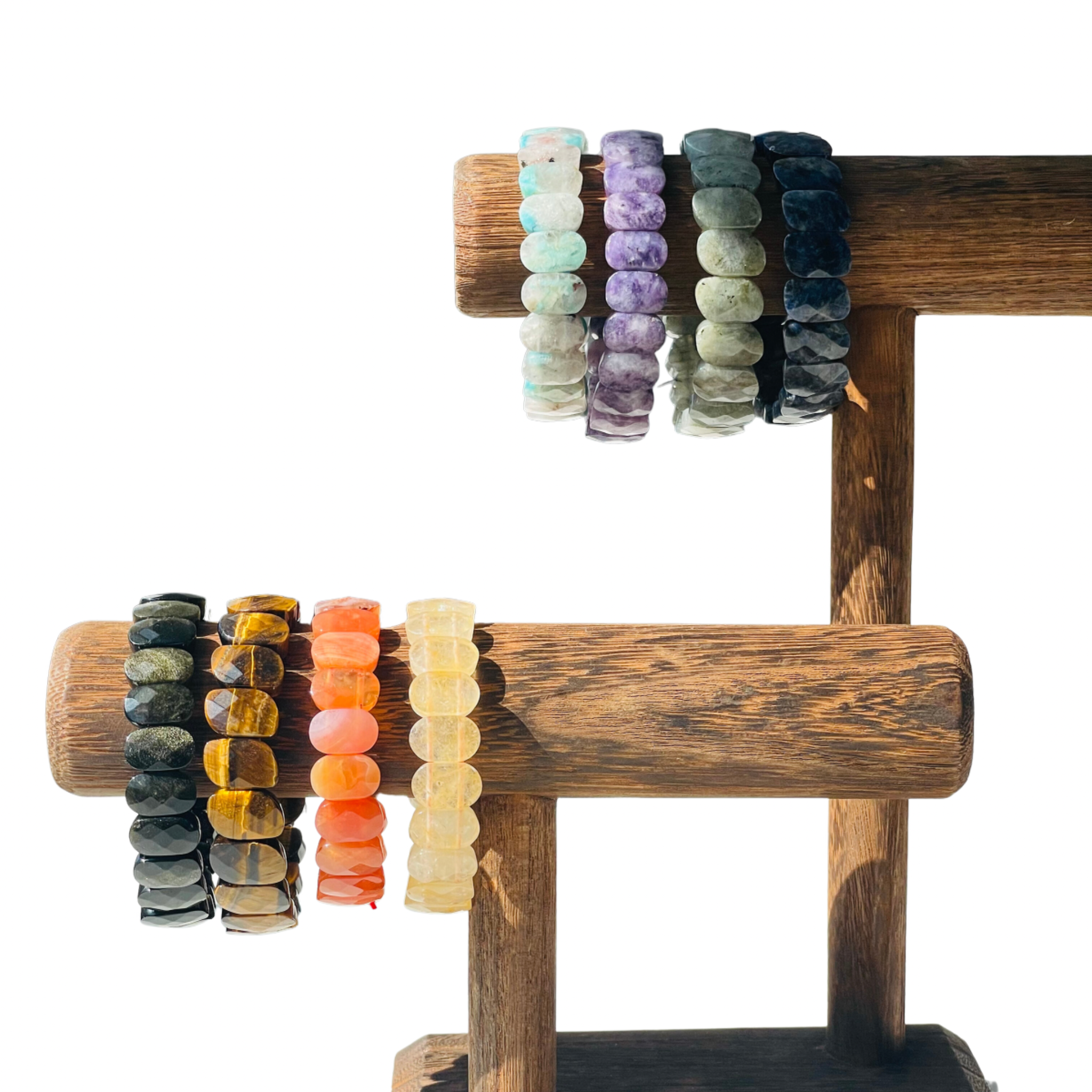 Obsidian Carnelian Amazointe Tigers Eye Citrine Bracelet hanging on wood display