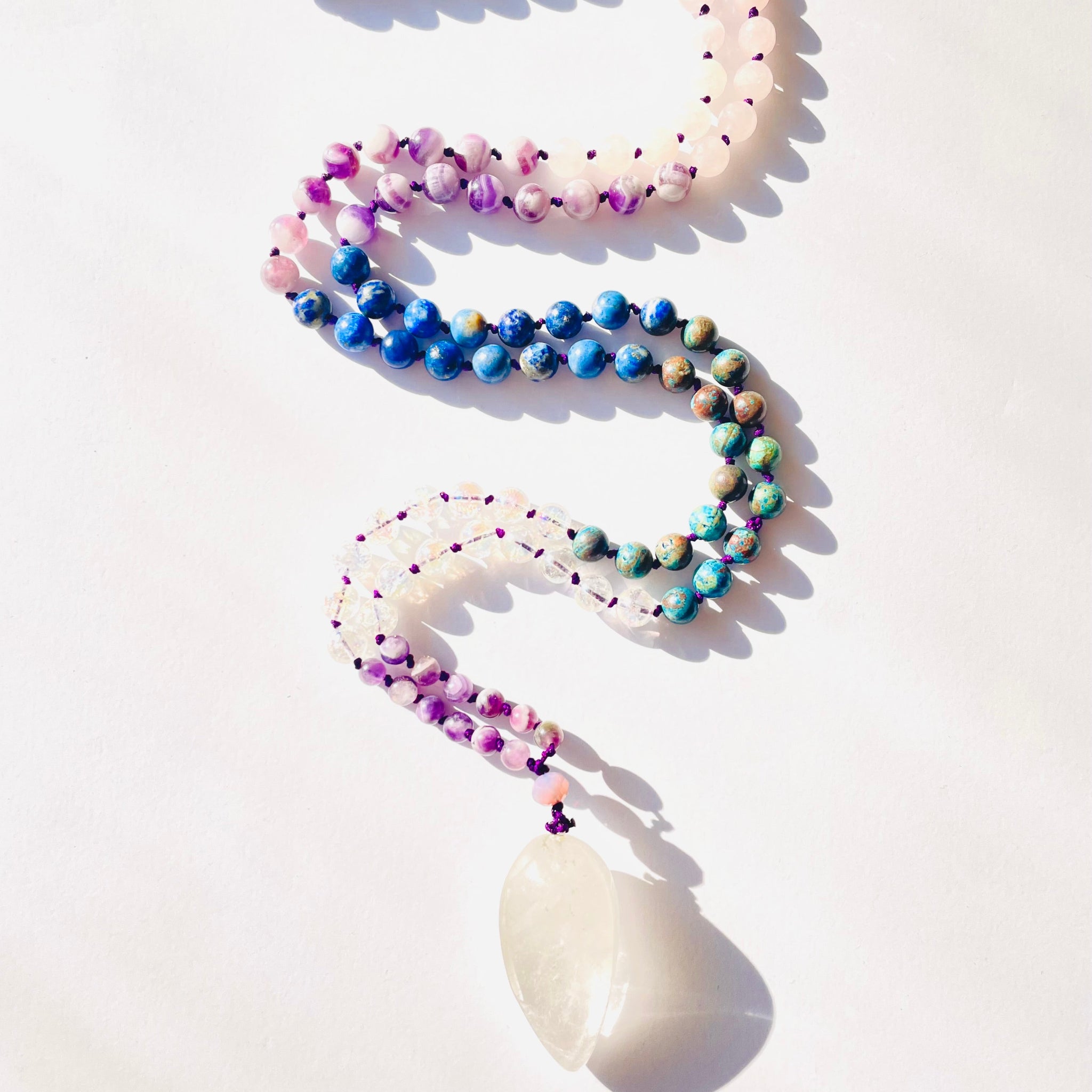 Higher Power Mala on white surface