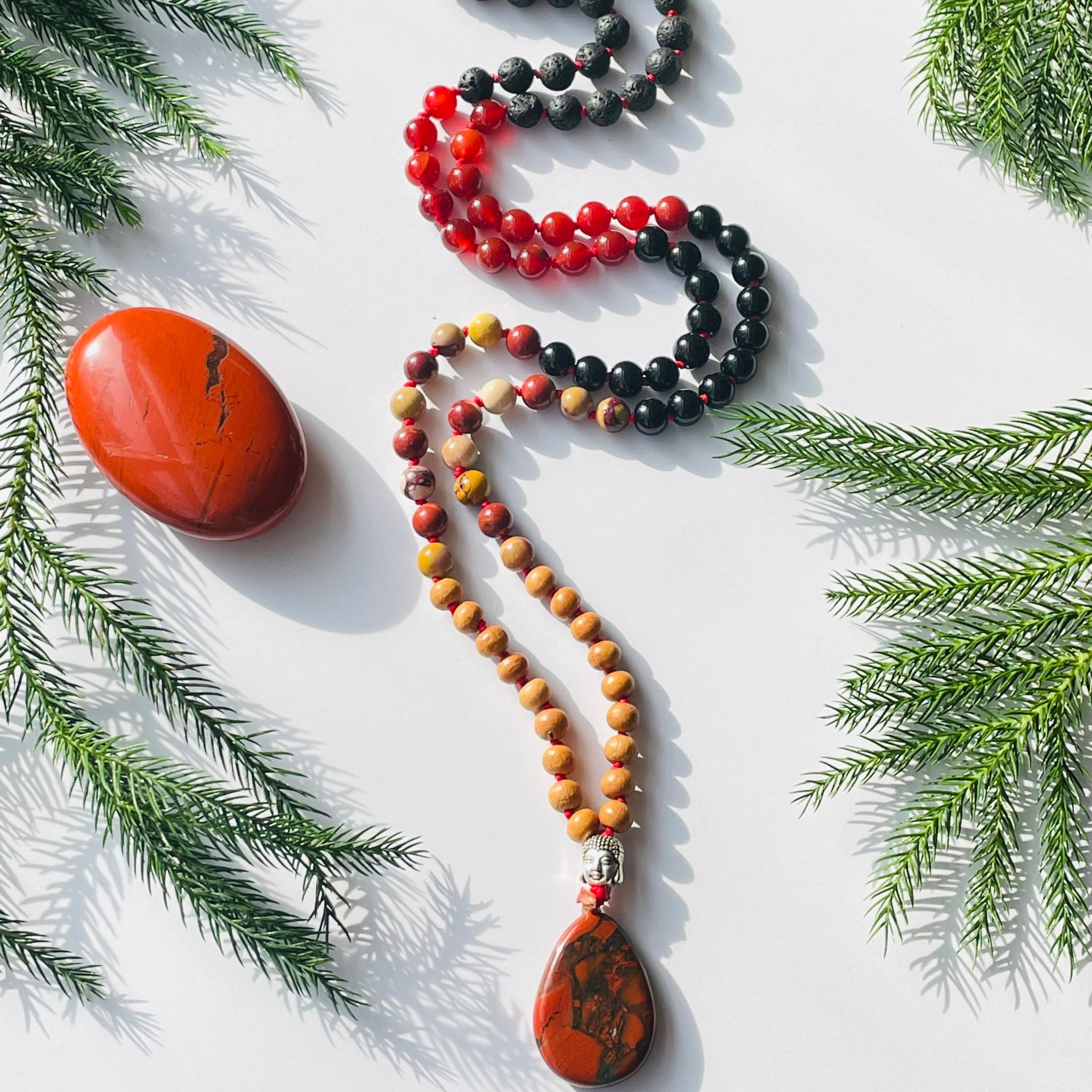 beaded red and black gemstones with red pendant