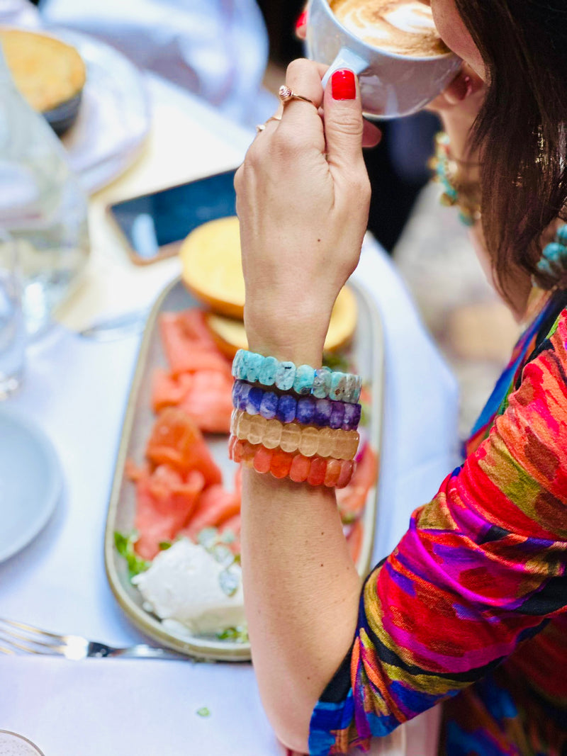 Carnelian Amazonite Lepidolite Citrine bracelets displayed on arm