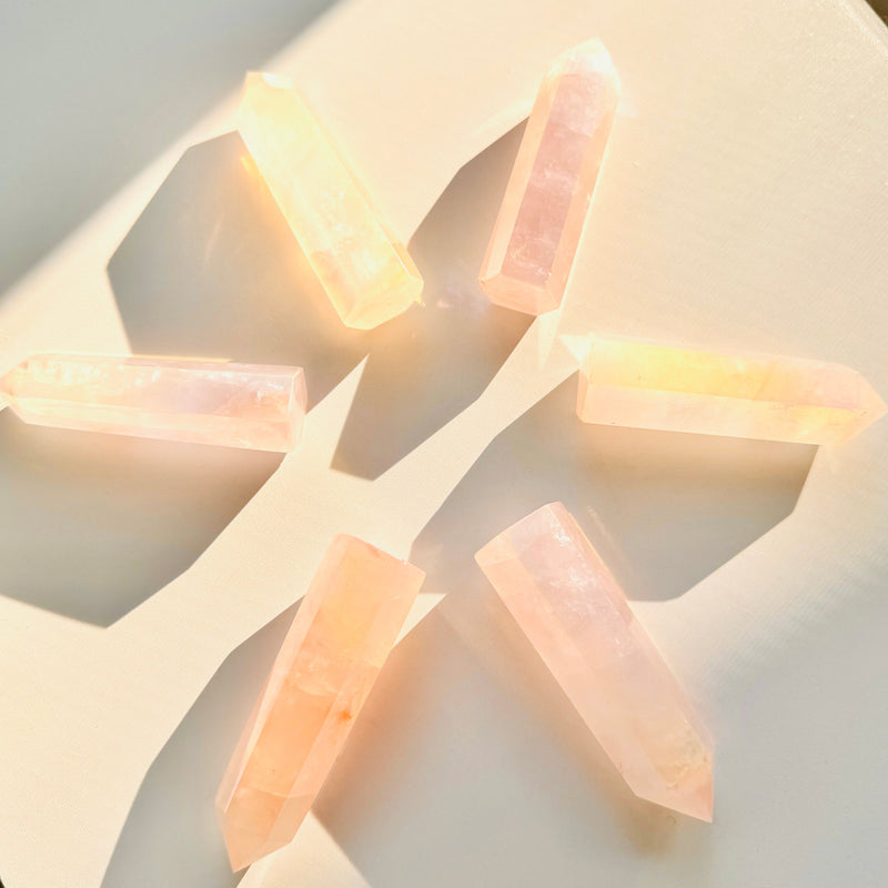 Close-up of Aura Coated Rose Quartz Tower Crystal making a geometric shape