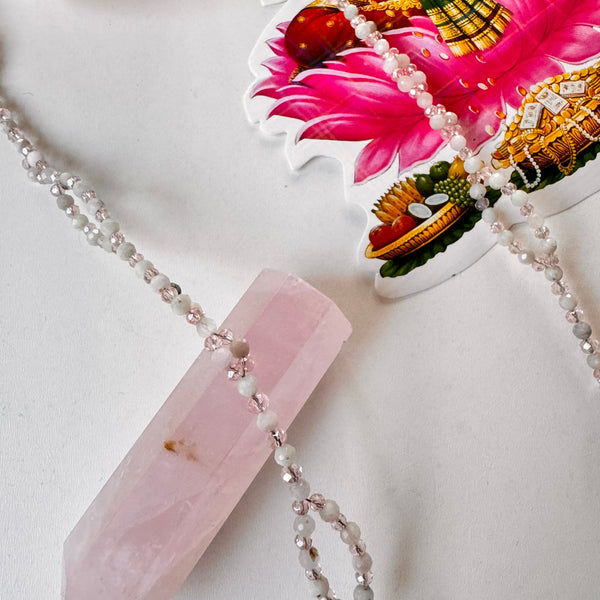 closeup Kunzite Tantric Necklace with pink crystal
