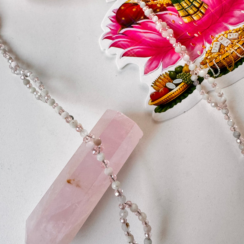 closeup Kunzite Tantric Necklace with pink crystal
