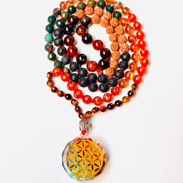 Multicolored beaded necklace with a crystal pendant on a white background