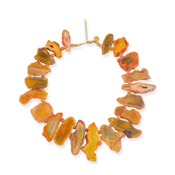A statement necklace featuring slab cut yellow agate stones set in a 22K gold plated silver finish, with a lobster clasp closure.