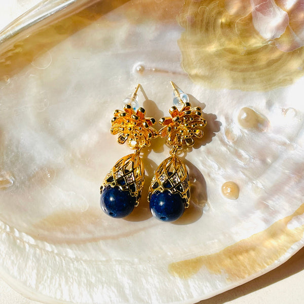 Lapis Lazuli earrings on decorative seashell