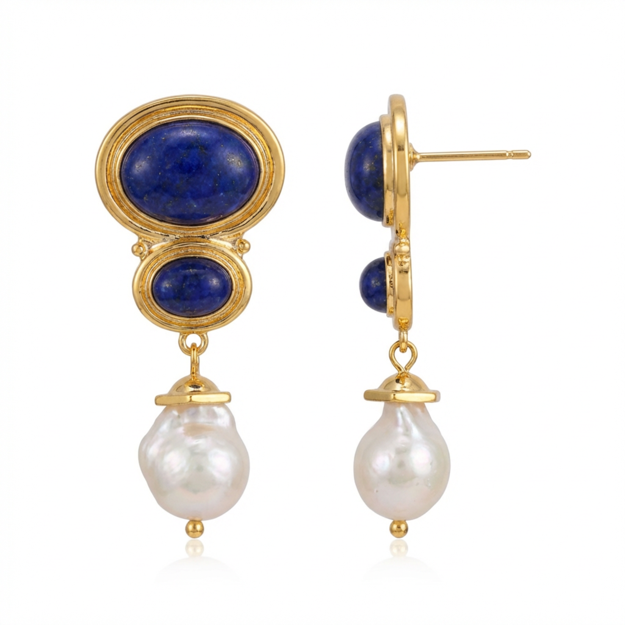 Gold earrings with blue stones and pearl drops on a white background