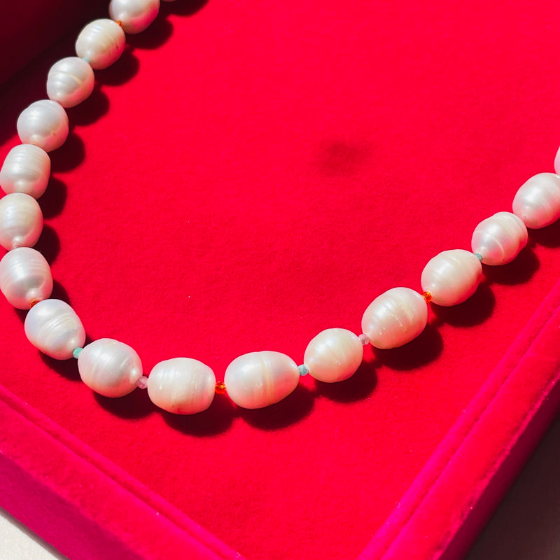 Midi Pearl Necklace with crystals on display