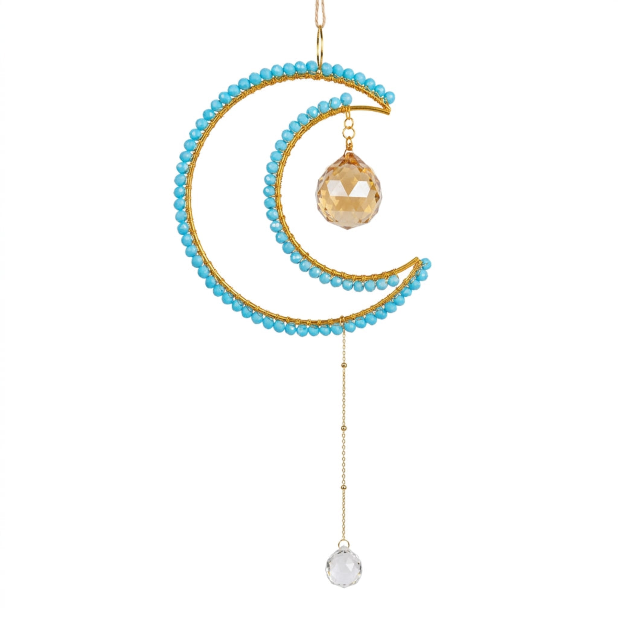 A crescent moon-shaped hanging ornament with gold-tone metal framing, turquoise blue beads along the outer curve, a faceted amber crystal pendant, and a long dangling chain ending in a clear round crystal drop, shown on a plain white background.