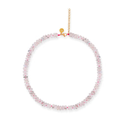 A beaded moonstone necklace with a gold-plated silver closure, displaying a series of round moonstone beads on a chain.