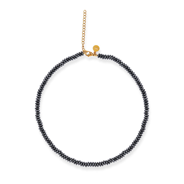 A black hematite necklace with a gold plated sterling silver lobster clasp closure.