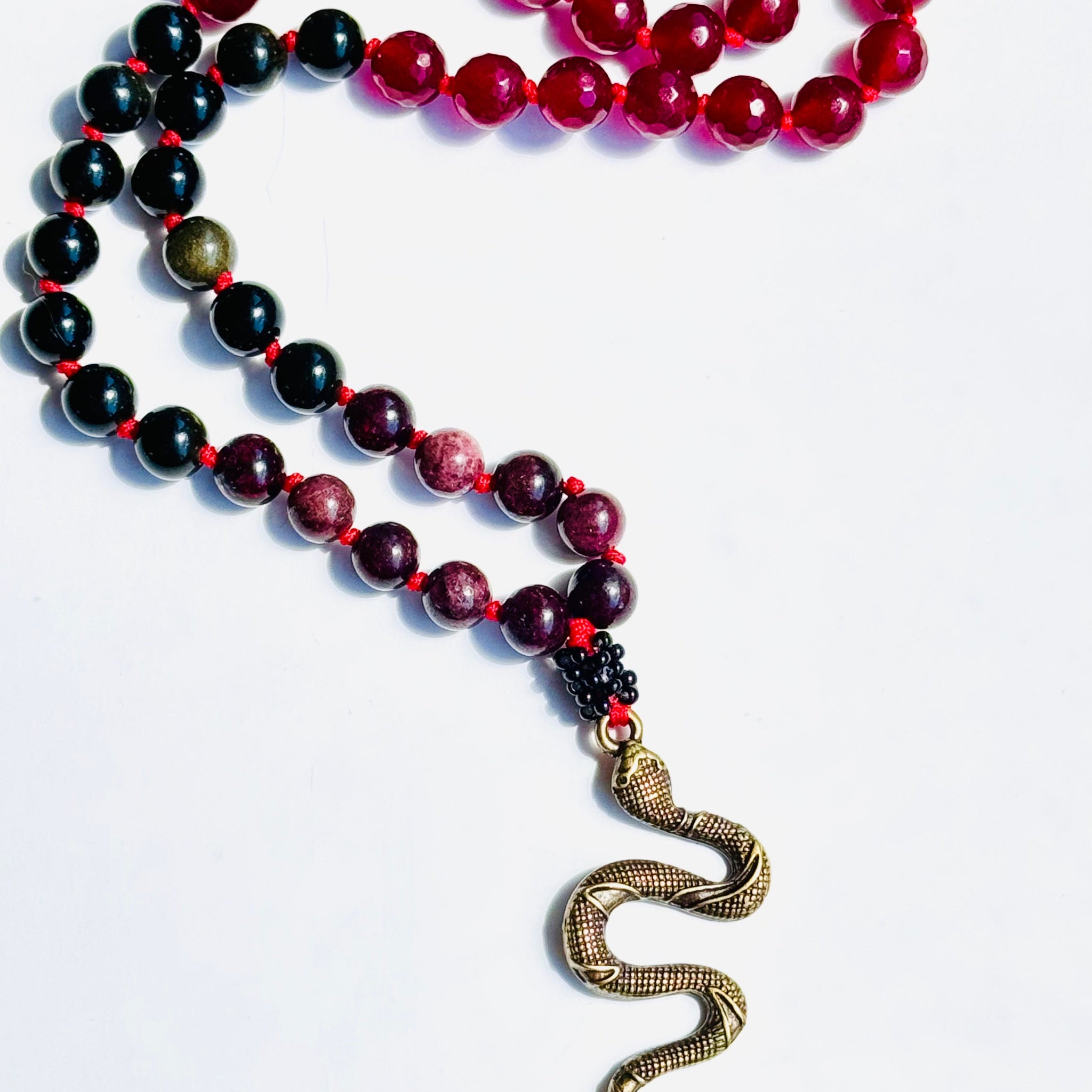 Transformation mala pendant
