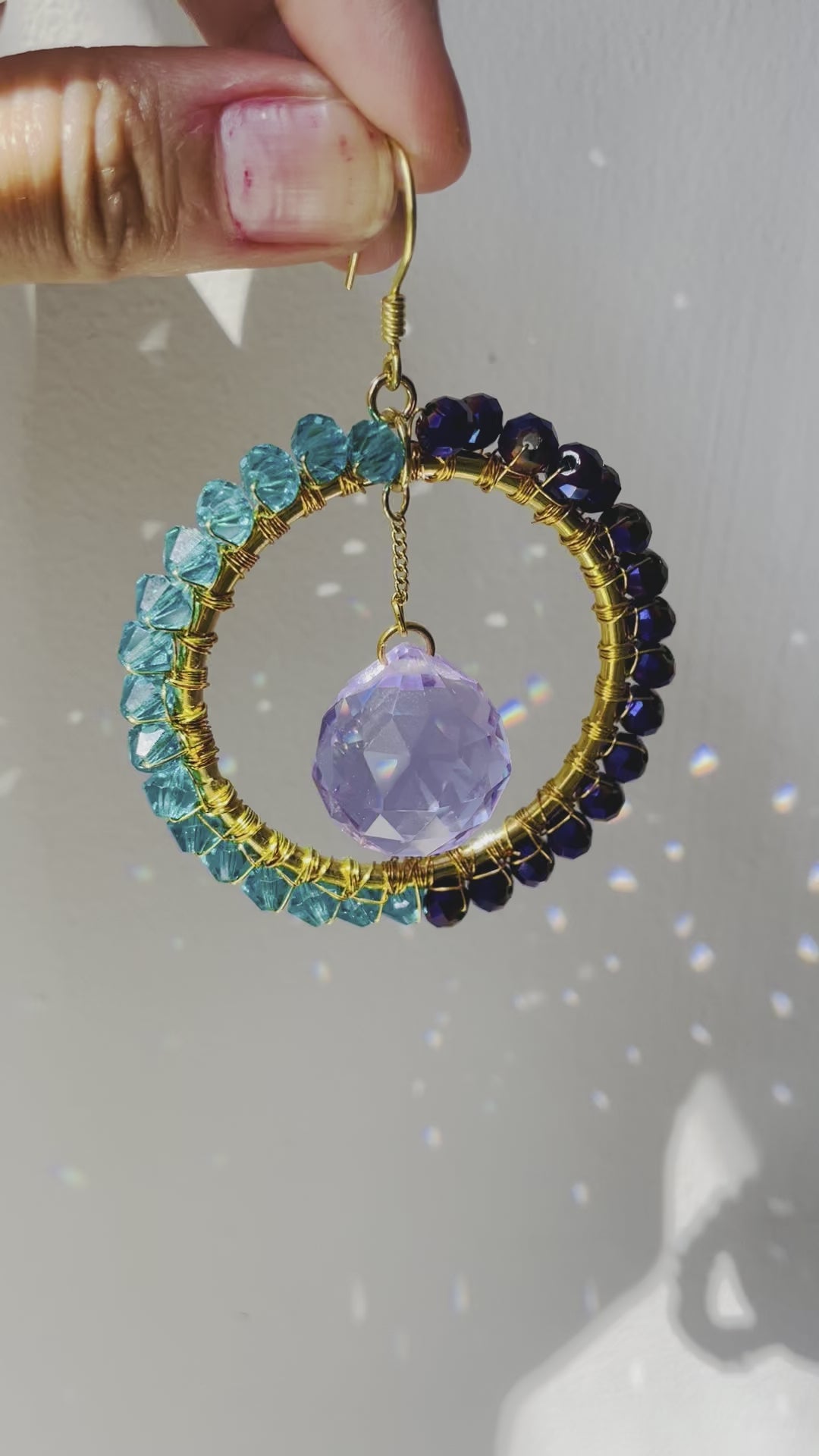 Video of single Magnetic Earring creating sparkles on the wall