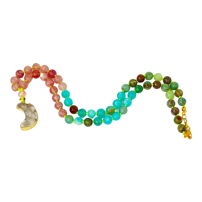 pink blue and green beaded gemstone necklace with crescent pendant