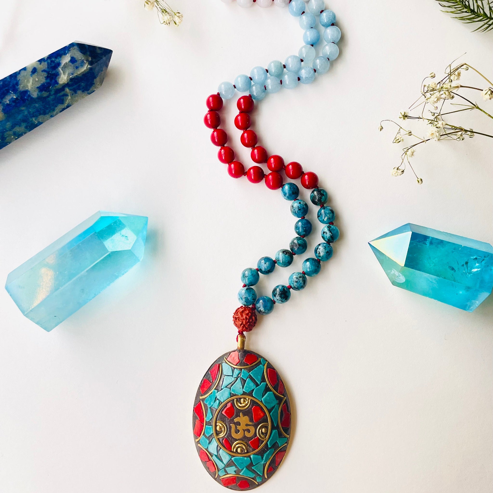 blue red and white gemstones beaded with red and blue pendant