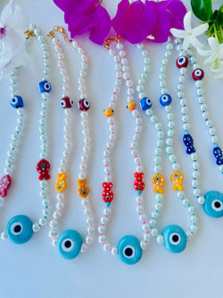 Beaded pearl necklace with Evil Eye and glass beads