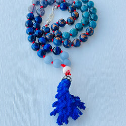 Integrity Half Mala Necklace on white surface