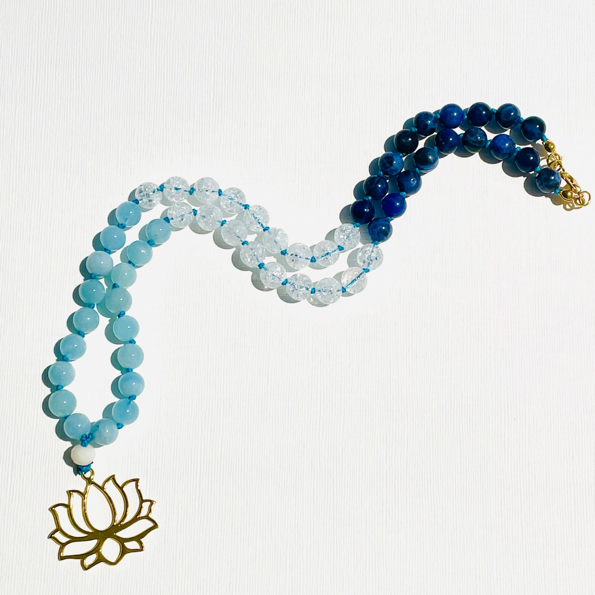 beaded gemstone necklace with lotus pendant