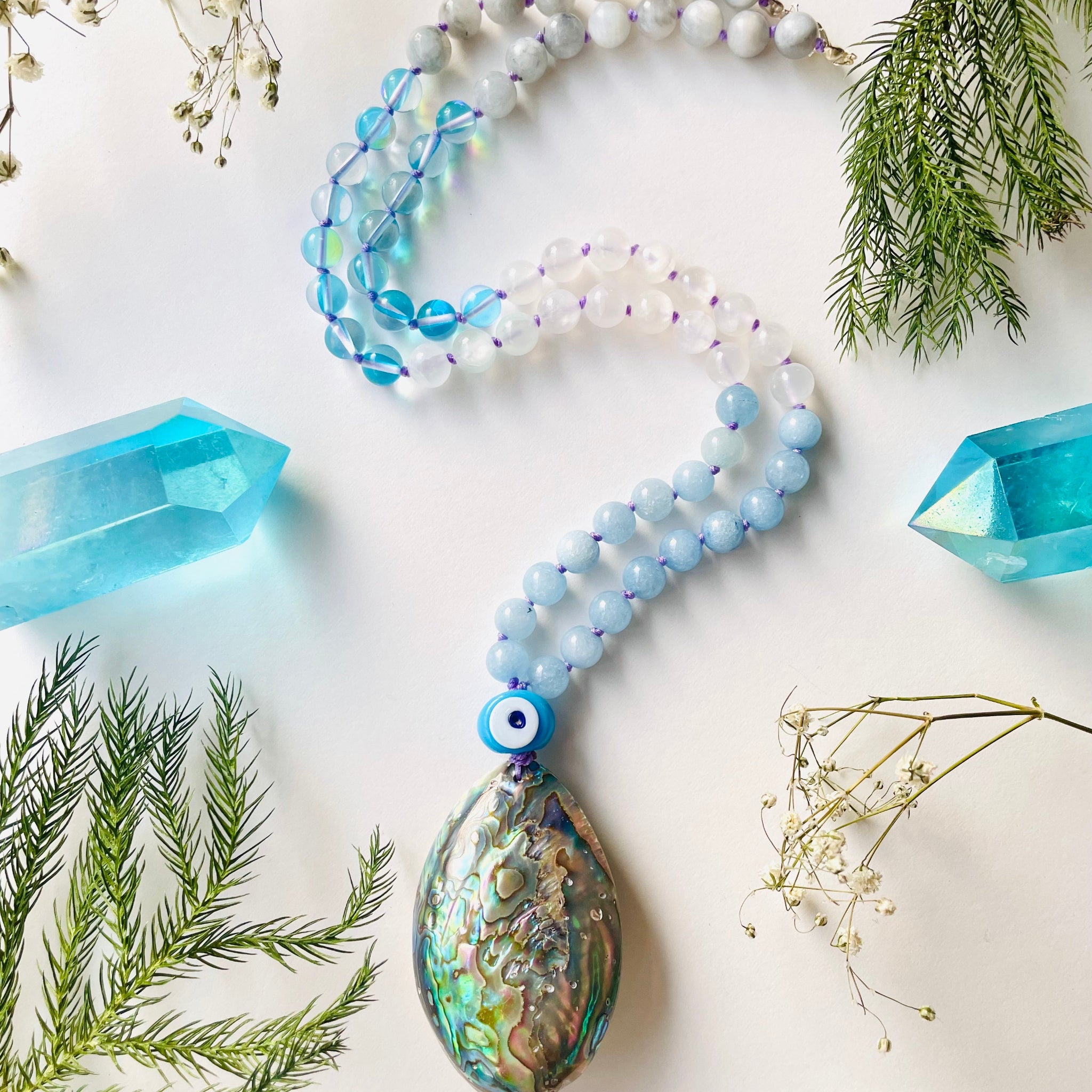 Ocean Necklace with blue crystals and decorative pine