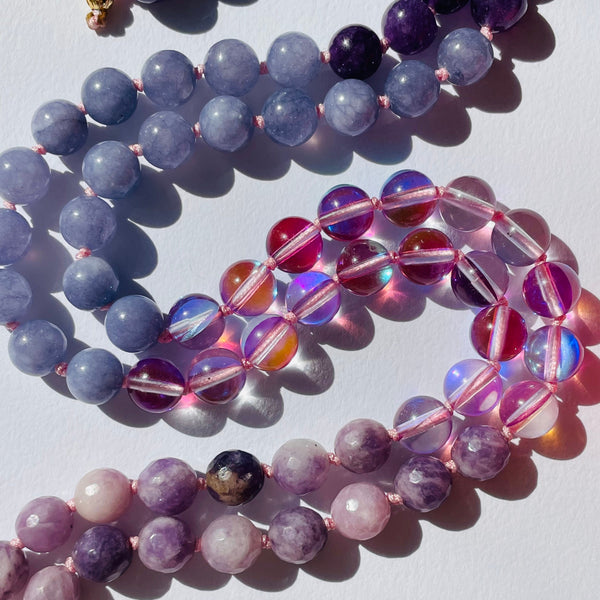 closeup image of spirit necklace lavender gemstones
