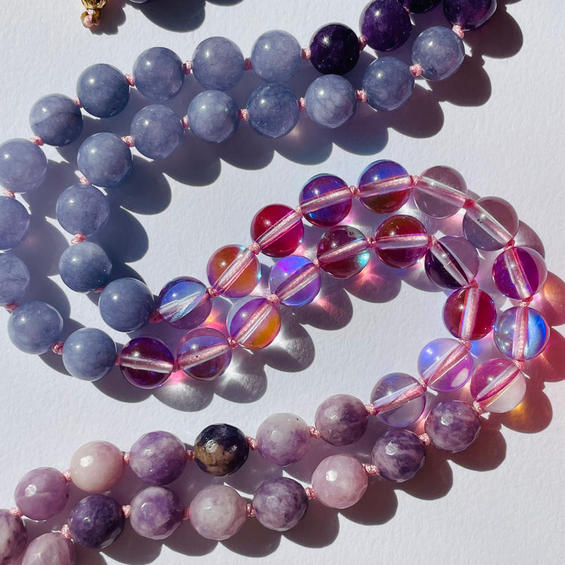 closeup image of spirit necklace lavender gemstones