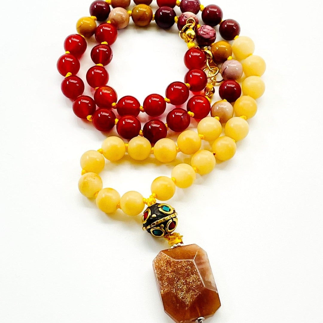 beaded gemstone necklace yellow red and brown gems