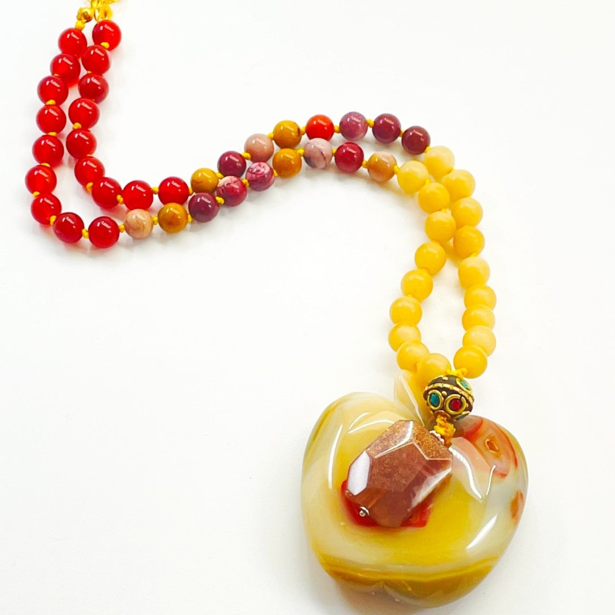 beaded gemstone necklace yellow red and brown gems